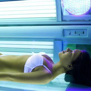 Lady in tanning bed